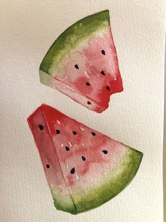 two slices of watermelon painted on white paper