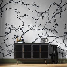 a black and white tree wallpaper with birds on the branches in front of it