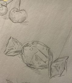 a drawing of some fruit on a piece of paper