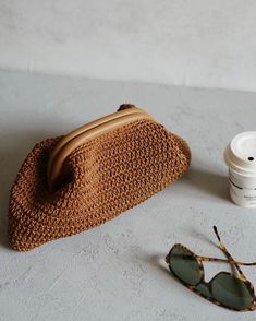 Hand Knitted Pouch Bag For Everyday Use, Hand Knitted Everyday Pouch Bag, Brown Crochet Clutch Bag With Removable Pouch, Hand Knitted Pouch Shoulder Bag For Daily Use, Brown Clutch Straw Bag For Everyday Use, Hand Knitted Pouch Shoulder Bag, Handmade Brown Clutch Pouch, Handmade Brown Crochet Clutch Bag, Brown Rectangular Crochet Bag For On-the-go