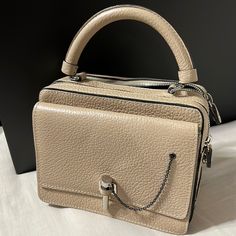 Perfect For Night Out Or Everyday Use! Cross Body Or Hand Held. Beige Top Handle Satchel With Silver-tone Hardware, Rectangular Flap Bag With Silver-tone Hardware For Daily Use, Designer Box Bag With Silver-tone Hardware For Travel, Daily Use Top Handle Box Bag With Silver-tone Hardware, Beige Top Handle Bags With Silver-tone Hardware, Luxury Box Bag With Silver-tone Hardware For Everyday, Rectangular Flap Bag With Palladium Hardware For Daily Use, Leather Tote Box Bag With Silver-tone Hardware, Daily Use Flap Bag With Palladium Hardware