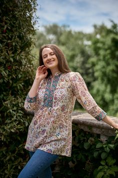 🌷 FLORINA Add a splash of colour to your wardrobe with our Florina Tunic in vibrating floral prints. Florina was created for a comfortable loose fit, and decorated with floral hand block prints. Sizings: Size S:   Shoulders 38cm - 14.9" Bust  96cm - 37.7" Length approx. 71cm - 29.5" Size M:   Shoulders 40cm - 15.7" Bust  100cm - 40" Length approx. 75cm - 29.5" Size L:   Shoulders 44cm - 17.3" Bust  106cm - 42" Length approx. 75cm - 29.5" Materials: Fabric: 100% Hand Block Printed Cotton  Care I Summer Pink Floral Print Kurta, Spring Vacation Floral Print Kurta, Spring Vacation Kurta With Floral Print, Casual Pink Summer Kurta, Casual Pink Kurta For Summer, Pink Bohemian Relaxed Fit Blouse, Spring Folk Style Multicolor Kurta, Bohemian Short Sleeve Blouse For Garden Party, Folk Style Multicolor Spring Kurta