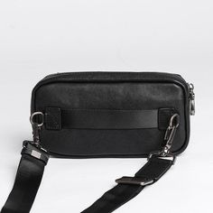 Specifications: Material: Top layer cow hide vegetable tanned leather Inner lining: Thickened polyester cotton Color: Black Size: 20.5cm wide, 10.5cm high, 3.5cm thick Shoulder strap: The length is about 154cm and can be adjusted Internal structure: Main bag, 3-clip, inner patch bag, outer magnetic buckle bag Note * the size measured by hand will have 1-3cm error, please take the real object as the standard Package list: Messenger Bag * 1 Black Crossbody Mobile Phone Belt Bag, Casual Leather Phone Bag With Zipper, Casual Leather Phone Bag With Zipper Closure, Black Belt Bag With Mobile Phone Holder, Black Belt Bag For Mobile Phone, Modern Black Phone Bag With Adjustable Strap, Black Chest Bag With Detachable Strap For Daily Use, Leather Chest Bag With Zipper Closure For On-the-go, Classic Black Belt Bag With Detachable Strap