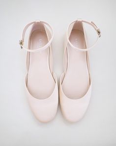 Inspired by a contemporary and refined ballet style flat. Classic silky satin round toe flat with removable ankle strap brings an elevated elegance and makes this a classy and elegant shoes for wedding, evening wear, or romantic date.DETAILS:UPPER: Synthetic upper and liningMATERIALS: Manmade outsoleImported Material Timeless Formal Flats With Round Toe, Feminine Formal Flats With Bow, Elegant Spring Wedding Flats, Elegant Flats With Satin Bow And Round Toe, Elegant Slip-on Ballet Flats With Round Toe, Bridesmaid Shoes Flat, Flat Prom Shoes, Formal Flats, Elegant Shoes Flat