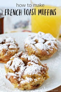 french toast muffins on a white plate with powdered sugar and orange juice in the background