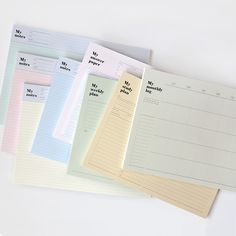 five sheets of lined paper on top of each other