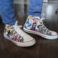 "⭐ FREE SHIPPING ⭐ What's your favorite 90s cartoon character's style? Now you can rock their look with your very own pair of 90s Cartoon Network Custom Sneakers! These stylish hippie sneakers are inspired by the characters from your favorite cartoons and are available in unisex sizes. Each shoe is hand-painted by a unique artisan, so you know you're getting a one-of-a-kind product. Benefits: ⭐ A must-have for any cartoon fan ⭐ Available in unisex sizes ⭐ Hand-painted by a unique artisan What ar Painted Converse High Tops, 90s Cartoon Network, Customised Vans, Angelus Paint, Cartoon High, Boyfriend Gift Ideas, Painted Converse, Custom Vans Shoes, Shoe Makeover