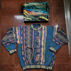 Vintage, Rare Coogi Crewneck Sweater In More Muted Colors W Paisley Design. 100% Cashmere. W Original Box (Box Has Some Damage). No Issues W Sweater. Includes Coogi Tissue Paper And Tags As Pictured. Stunning Construction - Made In Australia. Self-Purchased In Australia, Never Worn, Authentic. Coogi Sweater, Sweaters Vintage, Random Clothes, Paisley Design, Sweaters Crewneck, Box Color, Muted Colors, Crewneck Sweater, Clothes And Accessories