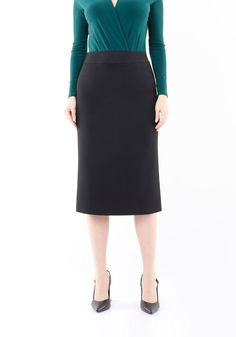 Stylish and Comfortable Women's Back Vented Midi Pencil Skirt for Work and Beyond Elevate your work wardrobe with our G-Line Back Vented Midi Pencil Skirt. This slim-fit skirt with a figure-hugging cut is perfect for stylish women who want to look and feel their best. The vented hemline adds a touch of elegance and makes it easy to move around. The simple and classic design makes it versatile and easy to pair with a blouse or a plain tank top. Available in sizes 4-24, this pencil skirt is perfec Pencil Skirt For Work, Plain Tank Tops, Skirt For Work, Slim Fit Skirts, Pencil Skirt Work, Midi Pencil Skirt, Black Pencil Skirt, Midi Skirt Pencil, Black Back