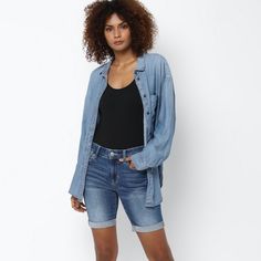 Shorter Than A Capri, Yet Longer Than Midi Shorts, The Aeo Skinny Bermuda Short Is The Perfect Mid-Thigh Length You Can Wear For Any Occasion! The Laid-Back Fit You Love In A Longer Length For More Coverage. Comfort Stretch For Every Day Wear And They’ll Never Bag Out, Ever! Featuring A Vintage High Rise Waistband, Concealed Button Fly Closure, 5 Pocket Styling, Belt Loops, And Gorgeous Whiskering & Factory Fading Throughout! Medium To Dark Blue Wash. This Vintage Style Was Uniquely Washed-Down Spring Denim Button-up Shorts, Spring Button-up Denim Shorts, Blue Button-up Jean Shorts For Summer, Casual Light Wash Button-up Bottoms, Button-up Jean Shorts For Summer, Casual Medium Wash Shorts With Rolled Hem, Button-up Denim Jean Shorts For Spring, Summer Button-up Jean Shorts, Casual Button-up Jean Shorts For Spring