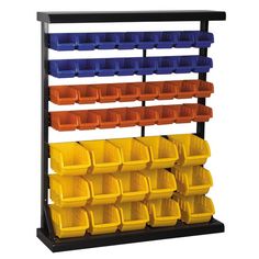 a rack filled with plastic bins on top of a white wall next to a black shelf