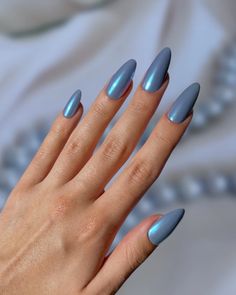 Blue Akoya Pearl – Muted Periwinkle with Aquamarine Chrome Nail One of the rarest pearl colors in the world, these exquisite periwinkle blue Akoya pearl nails have overtones of aquamarine. These are our take on the trending Hailey Bieber chrome nails.  Designed by Jas (@jasgotbars) Choose your preferred nail shape and Hailey Bieber Chrome Nails, Hailey Bieber Chrome, Blue Spring Nails, 22 Nails, Ongles Beiges, Blue Chrome Nails, Rare Pearls, Chrome Nail, Cleansing Pads