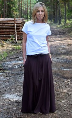 Long skirt with bow or tie to knit - thanks to 2 loose ribbons, sewn on wide rubber and of course with pockets. Made of 100% cotton knit. It's perfect for sandals, sneakers and even pins. Size (Length / width at the waist (without stretching the rubber)) US ---- UK ---- EU/DE 6 ------- 8 ----- 36/S (95/72) 8 ------ 10 ----- 38/M (96/76) 10 ----- 12 ----- 40/L (97/80) 12 ----- 14 ----- 42/XL (98/84) Dimensions in cm. 100% product EU. 100% cotton. Are you interested in a different color or size wr Brown Cotton Maxi Skirt For Spring, Cotton Brown Maxi Skirt For Spring, Long Brown Cotton Skirt, Spring Brown Cotton Maxi Skirt, Brown Cotton Long Skirt, Brown Long Cotton Skirt, Brown Relaxed Fit Maxi Skirt For Summer, Brown Gathered Maxi Skirt For Summer, Brown Relaxed Fit Lined Maxi Skirt