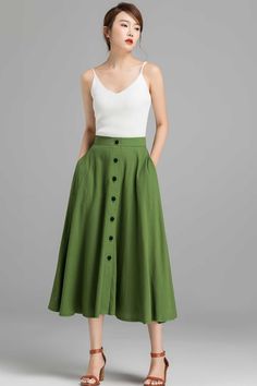 "This wonderfully retro button down Linen skirt is going to take you from the desk to dinner out and errands... Dressy and comfortable, The green Skirt offers a classic look that never goes out of style. DETAIL * Get 20 USD off over two color selection with the skirt (Code : TWOPIECESCYM) * 50% linen, 50% cotton * No lining * Seam pocket * Right side zipper closure, can't open buttons * Button down Linen skirt * Below Knee Length * A Line skirt, Midi skirt * Wash by hand or machine with cold wat Cotton Full Skirt With Buttons, Relaxed Full Skirt With Buttons, High Waist Skirt With Buttoned Pockets For Summer, Long Skirt With Button Closure, Buttoned Full Maxi Skirt, Summer A-line Skirt With Button Closure, Buttoned Flared Skirt, Flowy Full Skirt With Button Closure, Retro Flared Skirt With Pockets