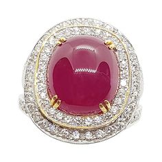 Cabochon Ruby 7.76 carats with Diamond 2.17 carats Ring set in 18 Karat White Gold Settings Width: 1.5 cm Length: 2.0 cm Ring Size: 53 Total Weight: 13.78 grams "We first opened doors in 1980 when it was then situated in the vicinity of the Victory Monument; a small and modest storefront with a couple of counters. From its humble beginnings to where it stands today, our company has proven its abilities as a jeweler. Since the beginning, we have been supplying fine quality pieces to dealers, whol Luxury Diamond Cabochon Gemstones, Luxury Diamond Gemstones With Cabochon Cut, Luxury Ruby And Diamond Oval Cabochon Ring, Luxury Ruby Ring With Oval Cabochon Diamond, Luxury Oval Cabochon Gemstones For Anniversary, Luxury Diamond Cabochons For Formal Occasions, Luxury Oval Cabochon Diamond Gemstones, Luxury Ruby Cabochon Diamond Ring, Luxury Cabochon Diamond Ring For Formal Occasions