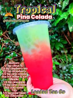 a hand holding a pink and green drink in front of some trees with text that reads tropical pina cola