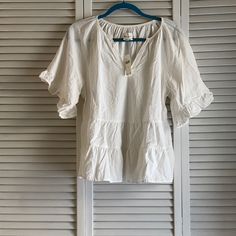 Anthropologie Ruffle Top Tiered Ruffle Hem Top For Vacation, Daytime Cotton Blouse With Ruffles, Chic Ruffled Tops For Daytime, Chic Tiered Blouse With Ruffle Hem, White Tiered Top With Ruffle Hem, Casual White Tiered Top, White Tiered Casual Tops, Chic Tiered Cotton Top, Chic White Tiered Top