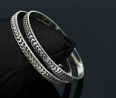 "925 sterling silver handcrafted design, stylish fancy vintage antique design tribal jewelry, excellent gift tribal belly dance jewelry. Metal-925 sterling silver. Item type-Bangles/Bracelet Weight- 30.750 grams. Width of bangles-6.0 mm approx. Size-2-8 or 2.5\" or 6.4 centimeters. Quantity-2 pieces.(1 pair) Stamped-925. Finish-Oxidized. Makes excellent gifting for birthday, wedding , anniversary, Christmas day. valentines day, mother's day." Silver Bangles Bracelets, Silver Kangan Design, Silver Bangle For Festivals, Festival Oxidized Bangle Jewelry, Oxidized Finish Bangle For Festivals, Hand Set Silver Bohemian Bangle, Traditional Silver Round Cuff Bracelet, Bohemian Silver Bangle Hand Set, Silver Bohemian Bangle With Hand Set Details