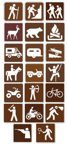 several different types of signs with people and animals on them in brown and white colors