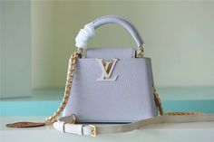 LV Capucines Mini Taurillon Light Blue/ Creme For Women Louis Vuitton Capucines Mini, Capucines Mini, Louis Vuitton Capucines, Womens Handbags, Mini Handbag, Lv Handbags, Mini Handbags, Evening Clutch Bag, Luxury Accessories