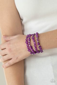 Bright purple irregular shaped beads in varying opacities, accented with shining faceted silver beads are threaded along stretchy bands and stack up the wrist for a glowing display.

 Sold as one individual bracelet. Trendy Fringe, Paparazzi Accessories Jewelry, Pink Peacock, Feather Fan, Purple Bracelet, Ball Necklace, Bright Purple, White Rhinestone, Black Feathers