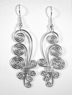 Cascading Spirals Hypo Allergenic Earrings by melissawoods on Etsy, $18.00 Swirl Shaped Metal Earrings As Gift, Swirl Shaped Metal Earrings For Gift, Handmade Swirl Metal Earrings, Handmade Metal Swirl Earrings, Hypoallergenic Spiral Metal Earrings, Handmade Silver Swirl Earrings, Silver Spiral Metal Earrings, Silver Swirl Wire Wrapped Earrings, Nickel Free Silver Swirl Earrings