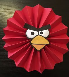 an angry bird made out of red paper