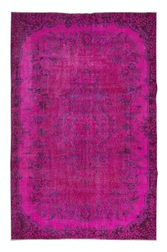 a pink and purple rug on a white background