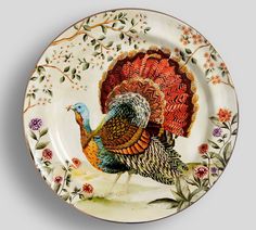 a plate with a turkey painted on it