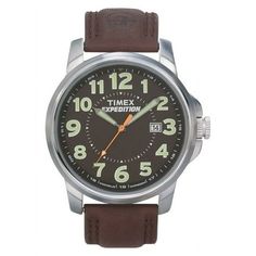 This casual analog watch by Timex features a metal case for durability. With an easy to set QUICK-DATE feature and an INDIGLO low-light feature, this watch is unfailingly user friendly. Easy to read, with full Arabic numerals around the clock face, this Timex Expedition metal field watch offers water resistance to a depth of 50 meters, or 165 feet. Its quartz movement provides accurate timekeeping, while the metal casing and rugged leather strap lend comfort and casual good looks to the timepiece. Case: Silvertone brass Caseback: Stainless steel snap-down Bezel: Silvertone brass Dial: Black dial Markers: Full Arabic Calendar: QUICK-DATE feature, Date at 3 o'clock Strap: Brown leather Clasp: Tang buckle Crystal: Mineral Crown: Push/pull Movement: Quartz Water resistance: 5 ATM/50 meters/165 Outdoor Stainless Steel Watch Accessories With Analog Display, Brown Analog Chronograph Watch For Outdoor, Outdoor Brown Analog Chronograph Watch, Brown Outdoor Chronograph Watch, Brown Chronograph Watch With Round Dial For Outdoor, Casual Leather Watch Accessories For Outdoor, Casual Automatic Watch Accessories For Outdoor, Brown Analog Watch For Everyday Use, Casual Leather Watch With Round Dial