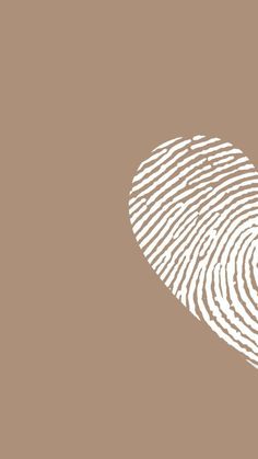 a fingerprint in the shape of a heart on a brown background with white lines