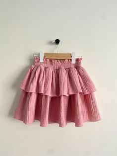 Adorable cotton muslin skirt for girls. Made from soft, lightweight, and breathable cotton muslin, this skirt is designed with comfort in mind--perfect for everyday wear. Its gentle fabric makes it ideal for toddlers who love to twirl, spin, and play freely. This skirt pairs beautifully with shirts, blouses, sweatshirts, and more. Whether for casual outings or special occasions, this skirt is sure to become a favorite for your stylish toddler girl! DETAILS: * Made of 100% OEKO-TEX certified doub Muslin Skirt, Stylish Toddler Girl, Girls Skirts, Double Gaze, Old Rose, Cotton Muslin, Gathered Skirt, Cotton Skirt