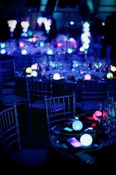 the tables are set up with candles and place settings for dinner or party guests to enjoy