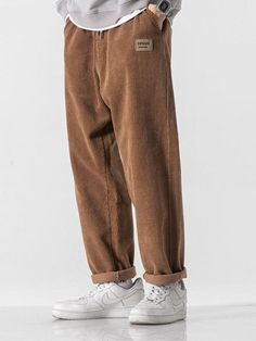 Add a cozy touch to your Soft Boy aesthetic with these Corduroy Jogger Pants. Crafted from premium cotton, the pants offer unbeatable comfort and style. The elasticated waist with a tie and ankle cuffs ensure a snug fit, while the cuffed hem adds a stylish twist. Featuring twin front pockets for added convenience, these joggers will quickly become your go-to choice for laid-back looks. Soft boy aesthetic Men's pants Elasticated ankle cuffs Elasticated waist with tie Cuffed hem Twin front pockets Cotton Corduroy material Cord Pants Outfit Men, Soft Boy Style, Japanese Trousers, Mens Casual Pants, Soft Boy Aesthetic, Corduroy Pants Men, Pants For Boys, Casual Pants Style, Soft Boy