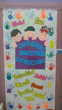 a bulletin board with children's hand prints on it