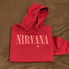 Nwt Nirvana Hoodie Gildan Heavy Blend Weight Muted Dark Red With Faded Orange Printed Logo Size Men’s Large Has Size Sticker Still On Front, But Not Paper Tag New And Unworn With No Flaws Armpit To Armpit Is 22” Seam Behind Neck Below Hood To Bottom Is 25.5” Nirvana Hoodie, Saved Pins, Paper Tags, Colorful Hoodies, Nirvana, Dark Red, Mens Shirts, Man Shop, Sweatshirts Hoodie