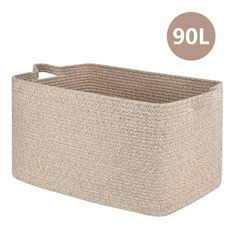 a large beige storage basket with handles