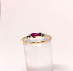 Natural Fine Ruby Diamond Gold Ring. Baguette Stone Ring. Precious Gemstone Ring in 14k SOLID GOLD For Her from our Capsule Jewelry Collection. Ruby Baguette and Diamond Gemstones are set in Half Bezel and Prong Setting in our Factory. Gold Ring AA+ Quality. Perfect Gift For Everyday or July Birthstone Gift for Your Loved Ones. ►  DIMENSIONS : ◆ Gemstone     :  Ruby 0.30 Cts                            :  Diamond 0.03 Cts ◆ Stone size     :  4*2 mm Ruby Ruby Ring With Baguette Diamonds For Gift, Red Baguette Diamond Rings As Gift, Ruby Jewelry With Baguette Diamonds As Gift, Capsule Jewelry, Ruby Diamond Ring, Ring Baguette, Half Bezel, Diamond Gold Ring, Ruby Diamond Rings