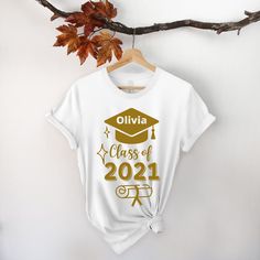 "Achiever Graduation T-Shirt, Graduation Personalized Shirt, Family Graduation Shirt, Class Of 2021 Shirt, Senior Custom Shirt, Senior Grad Welcome to my store :) I am so glad to see you here. I make my t-shirts with love. I am sure you will like them. Please make sure you check the size chart before ordering. Unisex size is fit for men but a little loose for women. If you want to have a fitter look, you can select one size smaller. The inscriptions on the T-shirts are black in light colors and Cotton Crew Neck Top For Graduation, Relaxed Fit Crew Neck Top For Graduation, Graduation T-shirt With Letter Print In Relaxed Fit, Custom Print Short Sleeve T-shirt For Graduation, Graphic Tee T-shirt For Graduation, Custom Print Cotton Tops For Graduation, Short Sleeve Shirt With Text Print For Graduation, Pre-shrunk Short Sleeve T-shirt For Graduation, Graphic Tee Crew Neck For Graduation