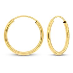 These continuous hoop earrings are styled in 14K yellow gold and are a chic addition to her jewelry collection. The high polish finish gives extra shine, and the earrings measure 1.5x14mm and secure with endless backs. Accessories Jewelry Earrings, Earring Backs, The High, Designer Earrings, Fashion Earrings, Types Of Metal, Stone Color, Diamond Jewelry, Gemstone Jewelry