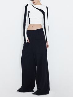 This is perfect for those who are looking for a clothing for a good price. It is fashionable, stylish, and it will look great on anyone who wears it. Do you wanahavit? Versatile Black Loungewear Tops, Chic Black Tops For Streetwear, Chic Black T-shirt For Layering, Versatile Black T-shirt For Work, Trendy Black Top For Loungewear, Trendy Black Loungewear Tops, Black Tops For Spring Loungewear, Black Cotton Minimalist Tops, Minimalist Black Cotton Tops