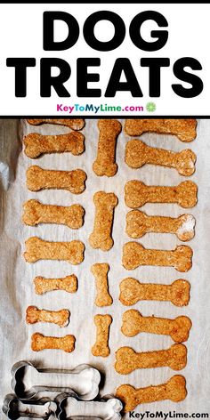 dog treats are laid out on a baking sheet and ready to be cooked in the oven