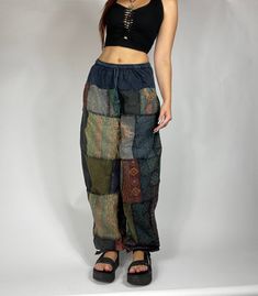 Bohemian mixed patchwork hippie pants in dark blue/ mixed color patches. Each pair is slightly unique and will have some different patches and colorings!. Waist stretches from 24-35' inches comfortably. Model is 5'2 for reference. Measurements: Inseam: 31’ Waist: 24’ to 35’ Blue Bohemian Outfit, Spiritual Outfit Boho Style, Dark Boho Style, Hippie Pants Outfit, Bohemian Streetwear, Dark Hippie, Swag Fits, Dark Bohemian, Gothic Hippie