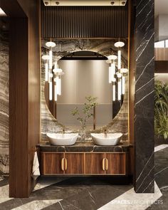 a bathroom with two sinks and a large mirror