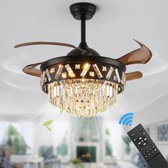 a ceiling fan with lights and remote control in a living room area, showing the light fixture