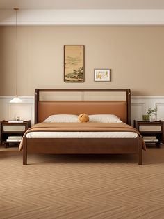 a large bed sitting in a bedroom on top of a wooden floor next to two nightstands