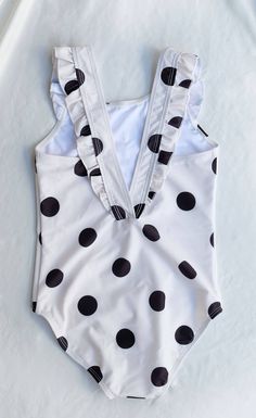 Marina West Swim Tank 1pc with Ruffle Around Shoulder Upf 50+ Cold water wash, line dry. No bleach. Polka Dot One-piece Swimwear For Pool, White Spring Swimwear For Swimming, Polka Dot Sleeveless Summer Swimwear, Sleeveless Polka Dot Summer Swimwear, Polka Dot Swimwear For Spring Swimming, Polka Dot Sleeveless Swimwear For Spring, Spring Sleeveless Swimwear With Polka Dot Pattern, Polka Dot One-piece Swimwear For Vacation, Polka Dot Swimwear For Spring And Summer