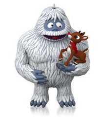 a cartoon character is holding a reindeer in his arms and looking at the camera man