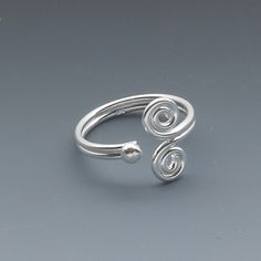 Sterling silver toe ring with double swirl design adjusts to fit most sizes. Ideal for display counters and artisan fairs. Afro Jewelry, Toe Ring Designs, Sterling Silver Toe Rings, Silver Toe Rings, Fire Mountain Gems And Beads, Fire Mountain, Fire Mountain Gems, Toe Ring, Swirl Design