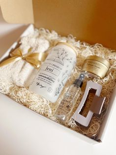 an open gift box containing some personal care items